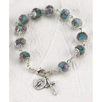 CRYSTAL LT BL ROSARY BRACELET