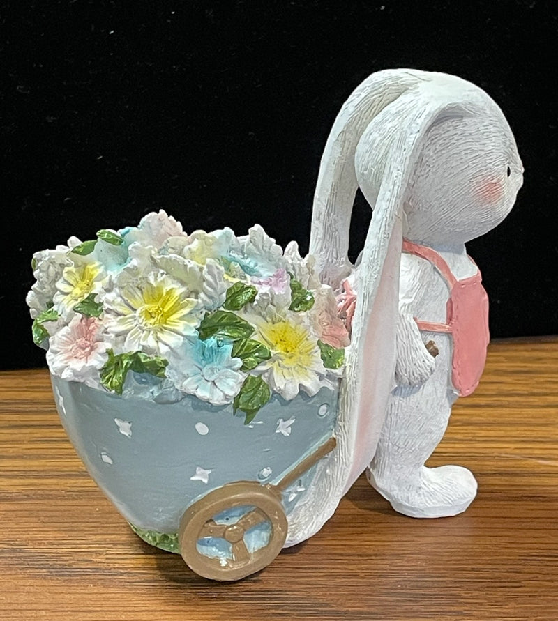 BUNNY WITH BLOOMS STATUE PINK