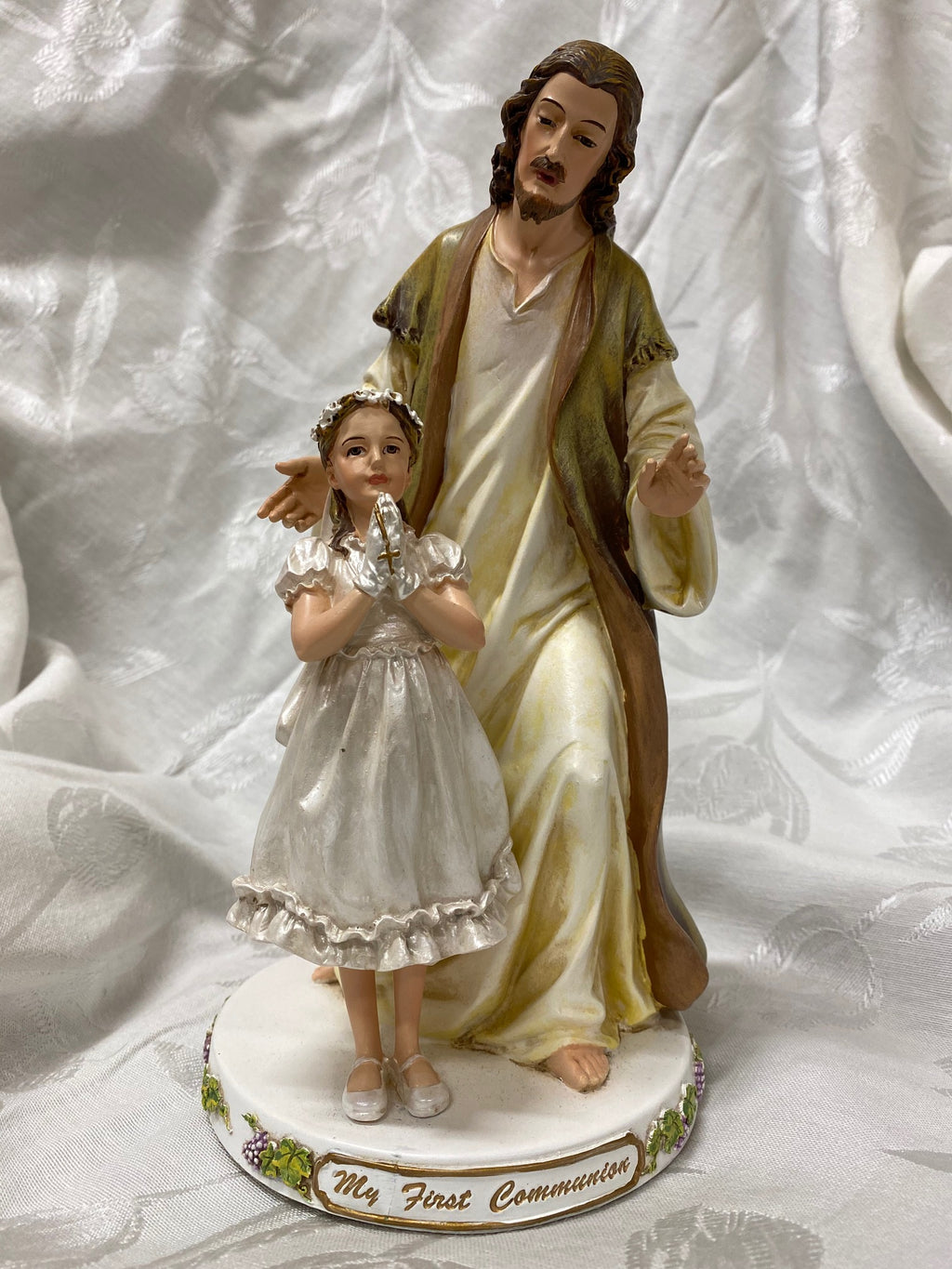 First Communion Statue of Jesus with a girl. 